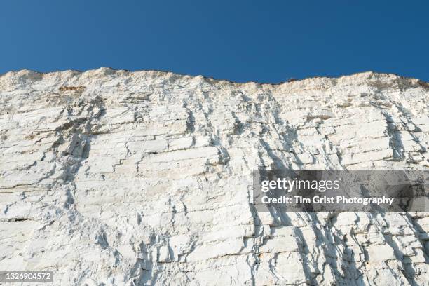 low angle view of chalk cliffs, east sussex, uk - cliff face stock pictures, royalty-free photos & images