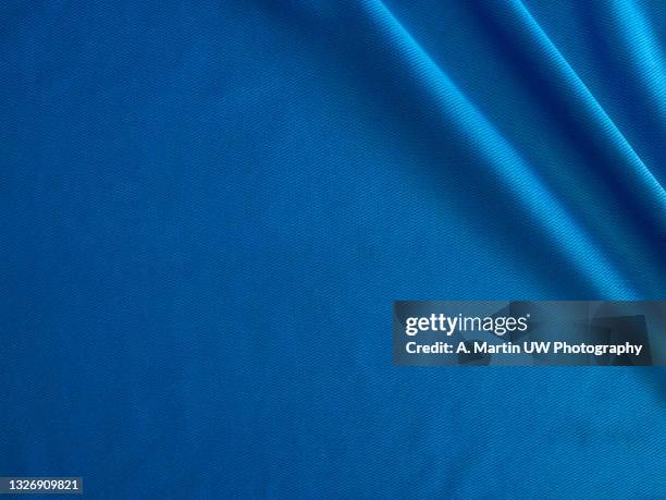 blue sport shirt texture background. detail of luxury fabric surface. - サテン　布 ストックフォトと画像