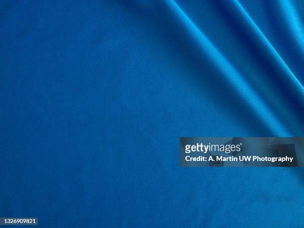 blue sport shirt texture background. detail of luxury fabric surface. - blue fabric texture 個照片及圖片檔