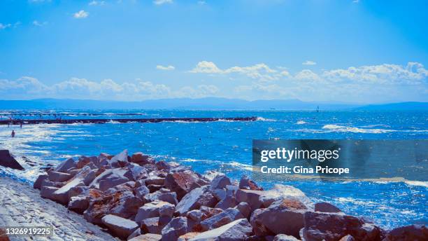 seafront in grado. - gorizia stock pictures, royalty-free photos & images