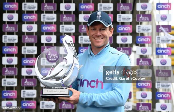 England captain Eoin Morgan holds up the series trophy after the third One Day International between England and Sri Lanka at Bristol County Ground...