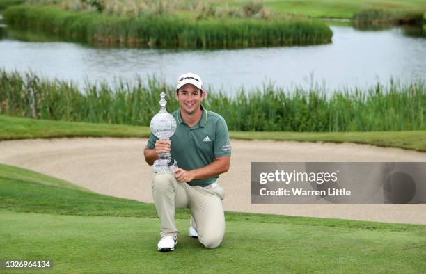 Lucas Herbert of Australia holds the winners trophy after the final round of The Dubai Duty Free Irish Open at Mount Juliet Golf Club on July 04,...