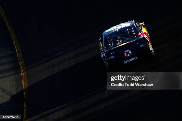 Kasey Kahne, driver of the Red Bull Toyota, races during the NASCAR Sprint Cup Series Kobalt Tools 500 at Phoenix International Raceway on November...