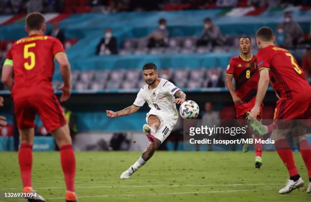 Lorenzo Insigne of Italy scores the 0-2 goal during the UEFA Euro 2020 Championship Quarter-final match between Belgium and Italy at Football Arena...
