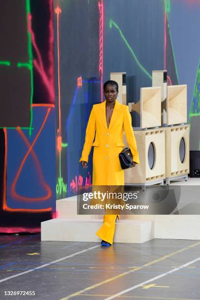 Model walks the runway during the Off-White Fall/Winter 2021/2022 show as part of Paris Fashion Week on July 04, 2021 in Paris, France.