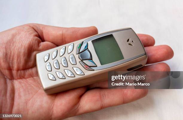 small antique mobile - 90s cell phone bildbanksfoton och bilder