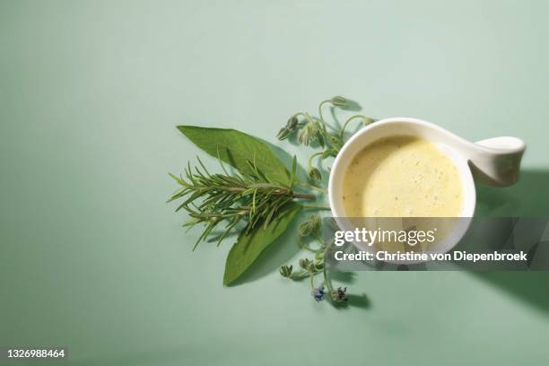 homemade herbal smoothie in a jar close up - soup vegtables stock-fotos und bilder