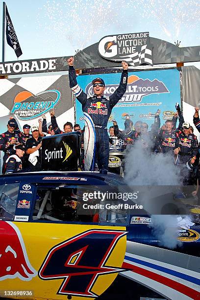 Kasey Kahne, driver of the Red Bull Toyota, celebrates in victory lane after winning the NASCAR Sprint Cup Series Kobalt Tools 500 at Phoenix...