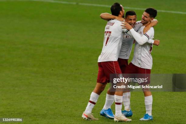 Andre of Fluminense celebrates with teammate Nene and Martinelli after a match between Flamengo and Fluminense as part of Brasileirao 2021 at Neo...