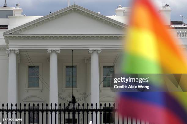 Rainbow flag is seen outside the White House on Independence Day on July 4, 2021 in Washington, DC. President Joe Biden and First Lady Dr. Jill Biden...