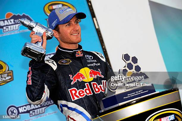 Kasey Kahne, driver of the Red Bull Toyota, celebrates in victory lane after winning the NASCAR Sprint Cup Series Kobalt Tools 500 at Phoenix...