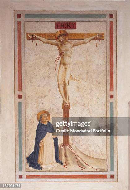 Italy, Tuscany, Florence, San Marco Convent, cell of the novices. Whole artwork view. Saint Dominican friar kneeling St Dominic Christ crucifix...