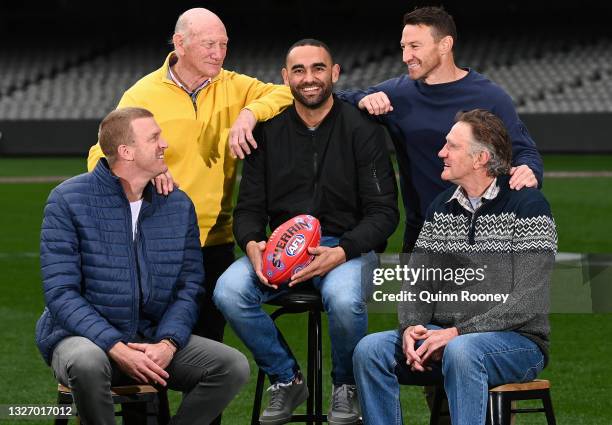Club' members Dustin Fletcher, Kevin Bartlett, Shaun Burgoyne, Brent Harvey and Michael Tuck pose together during a media opportunity at Marvel...