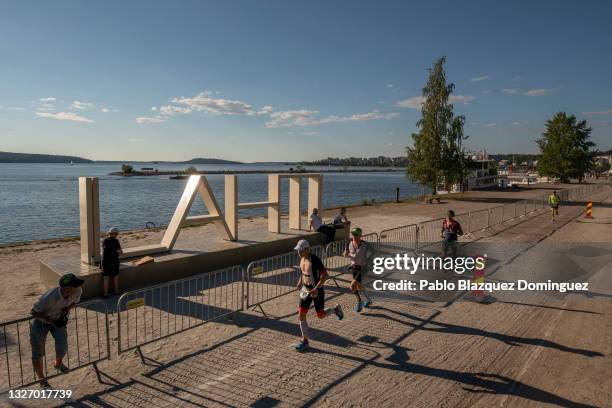 Athletes compete in the run leg of IRONMAN 70.3 Lahti on July 03, 2021 in Lahti, Finland.