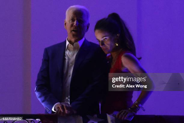 President Joe Biden and his daughter Ashley Biden watch the fireworks display during a Fourth of July BBQ event to celebrate Independence Day at the...