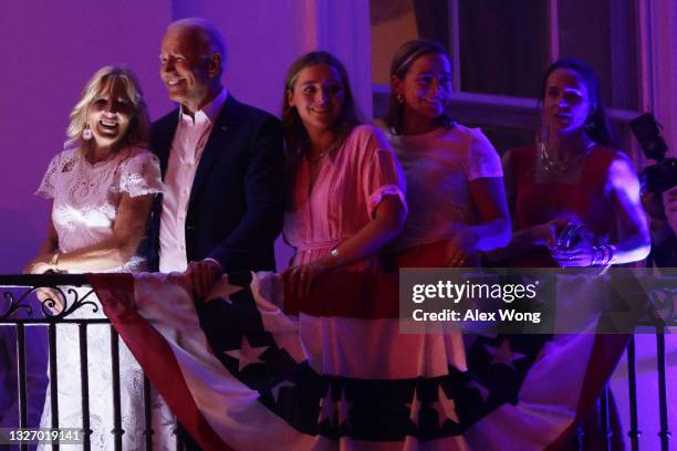 President Joe Biden, first lady Jill Biden , granddaughters Finnegan Biden and Naomi Biden and daughter Ashley Biden watch the fireworks display...