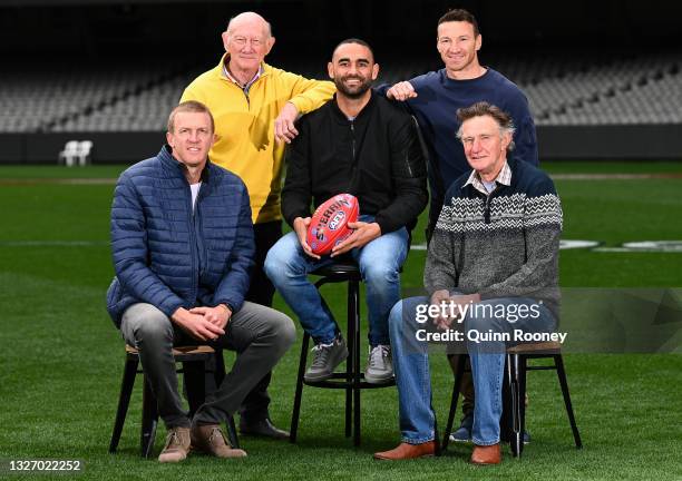 Club' members Dustin Fletcher, Kevin Bartlett, Shaun Burgoyne, Brent Harvey and Michael Tuck pose together during a media opportunity at Marvel...