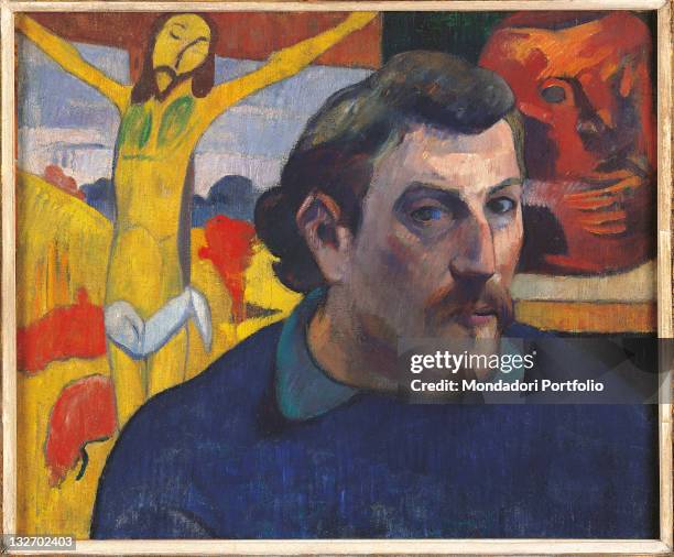 France, Ile de France, Paris, Muse dOrsay. Whole artwork view. Self portrait Gauguin yellow Christ orange shirt blue moustaches face.
