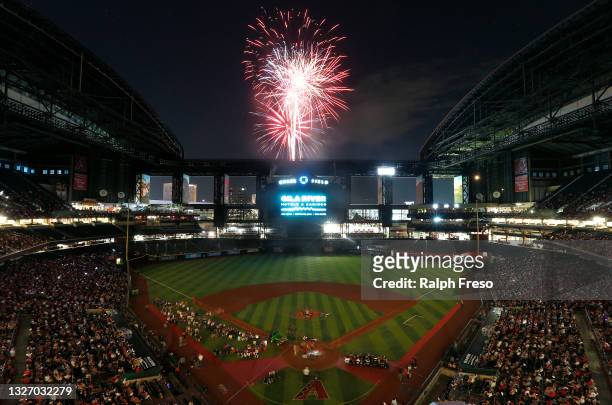 Fans enjoys a post-game fireworks display celebrating the Fourth of July following the MLB game between the Arizona Diamondbacks and San Francisco...