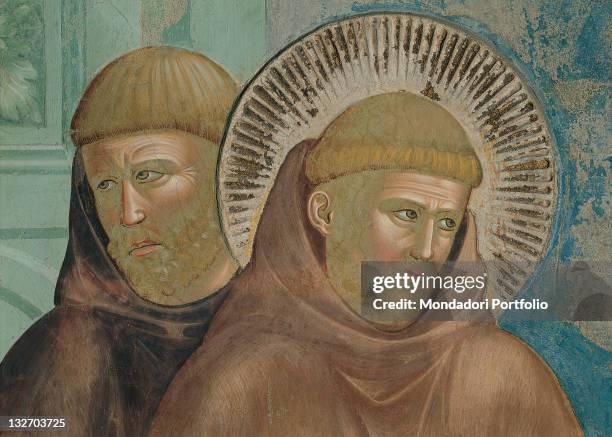 Italy, Umbria, Perugia, Assisi, Upper Basilica of San Francesco, nave. Detail. Face St Francis Franciscan friar monk beard men aureole halo.