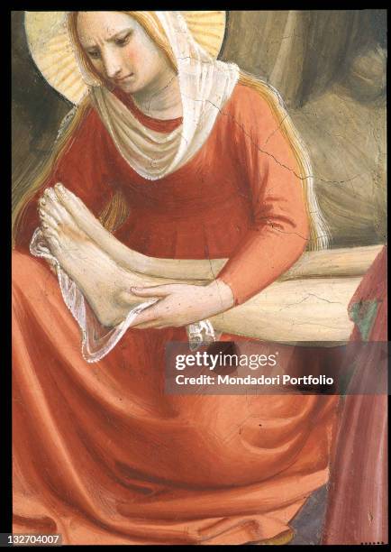 Italy, Tuscany, Florence, San Marco Convent, Capitular Room. Detail. Pious devout woman holding the feet of Christ, red tunic garment robe, veil,...