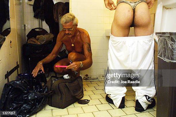 Year old Bernie Barker prepares himself July 16, 2001 to compete against other amateur strippers at Club LaBare, a North Miami Beach, FL ladies club....