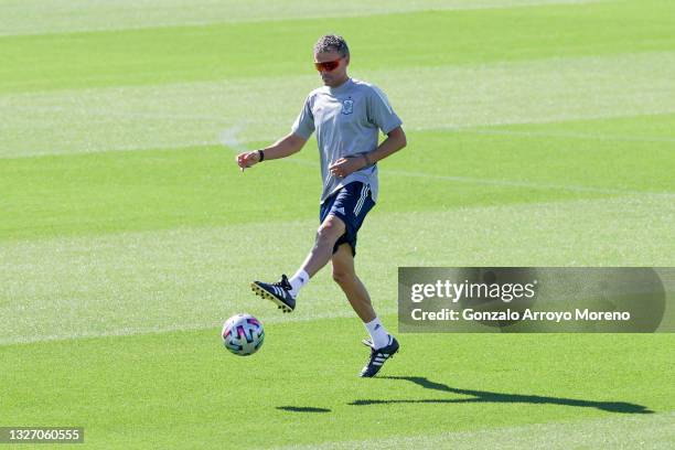 Luis Enrique, Head Coach of Spain controls the ball during the Spain Training Session ahead of the Euro 2020 Semi-Final match between Italy and Spain...