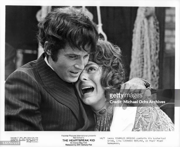 Charles Grodin comforts his bride Jeannie Berlin on their Miami honeymoon in a scene for the film 'The Heartbreak Kid', 1972.