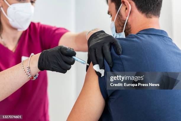 Person receives the Moderna vaccine against Covid-19 in the device launched by Acciona in Madrid, on July 5 in Madrid, . The company Acciona, which...