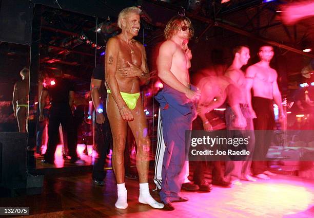 Year old Bernie Barker lines up with other strippers July 16, 2001 to be judged against them at Club LaBare, a North Miami Beach, FL ladies club....