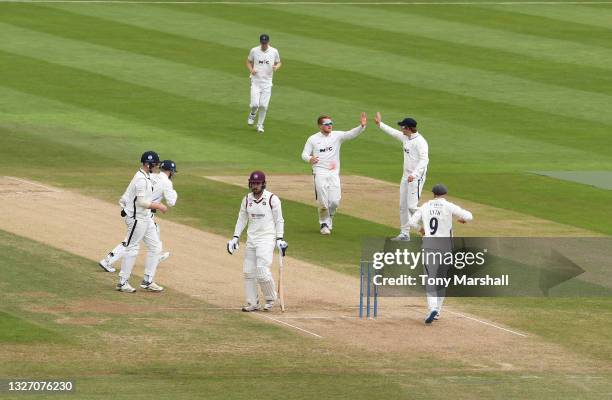 Charlie Thurston of Northamptonshire is caught out by Harry Duke of Yorkshire off the bowling of Dom Bess of Yorkshire during the LV= Insurance...