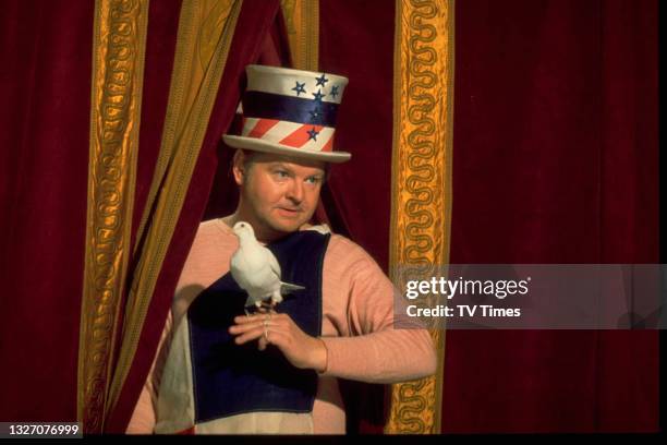 Comedian Benny Hill in character for a sketch, circa 1978.