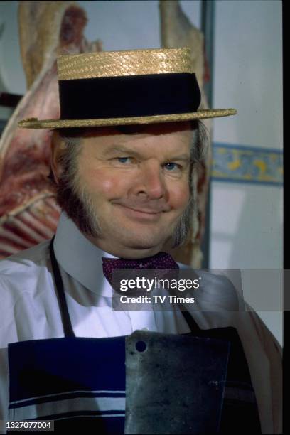 Comedian Benny Hill dressed as a butcher, circa 1978.