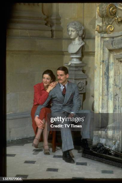 Actors Diana Quick and Jeremy Irons in character as Julia Flyte and Charles Ryder on the set of period drama Brideshead Revisited, circa 1981.