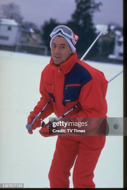 Comedian and television presenter Michael Barrymore photographed skiing, circa 1987.