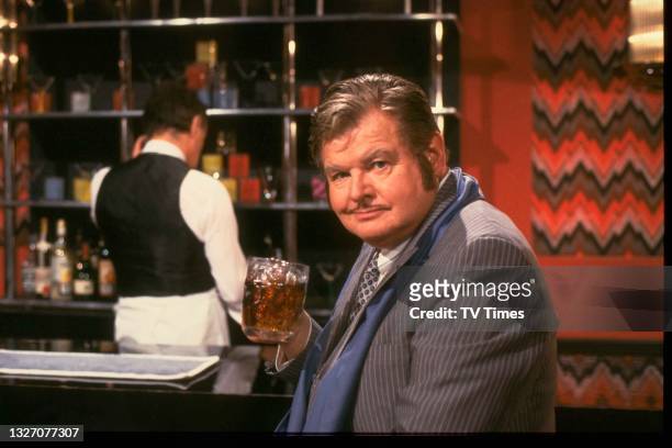 Comedian Benny Hill in character for a sketch, circa 1988.