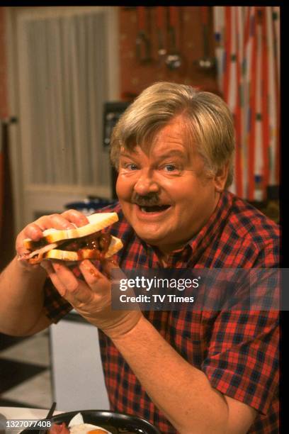 Comedian Benny Hill photographed on set in his comic sketch series The Benny Hill Show, circa 1986.