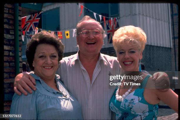 Betty Driver, Fred Feast and Julie Goodyear in character as Betty Turpin, Fred Gee and Bet Lynch in television soap Coronation Street, circa 1984.