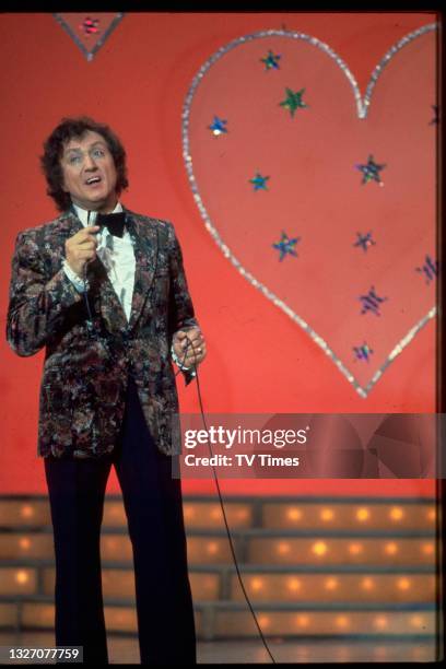 Entertainer Ken Dodd performing on the set of The Ken Dodd Laughter Show, circa 1979.