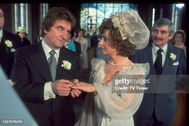 Actors Peter Adamson and Barbara Knox getting married as their characters Len Fairclough and Rita Bates in television soap Coronation Street, circa...