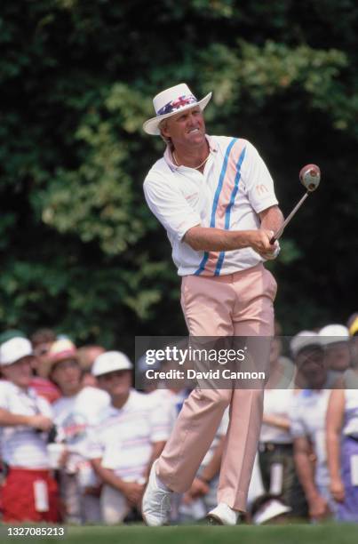 Greg Norman of Australia follows his drive off the tee during the 71st US PGA Championship golf tournament on 13th August 1989 at the Kemper Lakes...