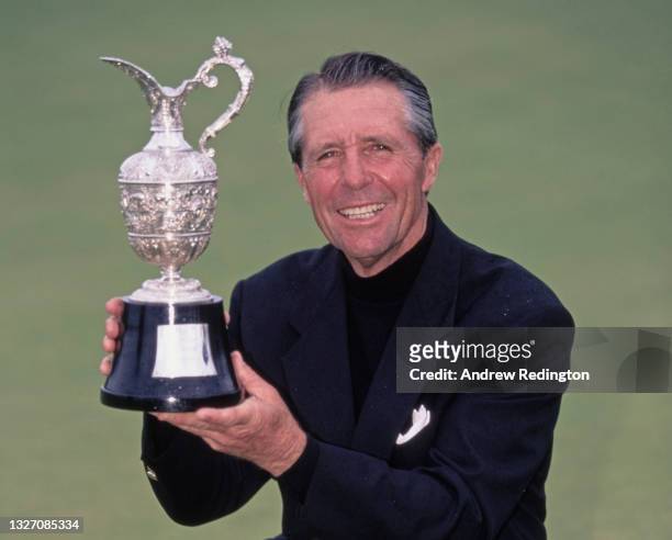 Gary Player of South Africa holds the Claret Jug as Champion golfer after winning the 1997 Senior Open Championship golf tournament on 27th July 1997...