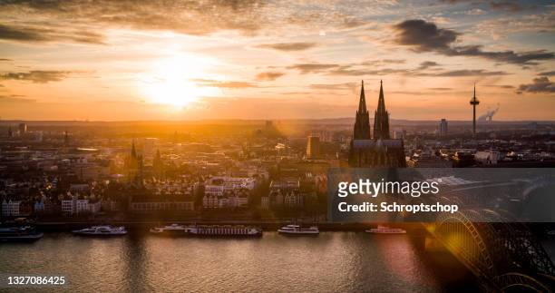 cologne skyline at sunset, germany - cologne stock pictures, royalty-free photos & images