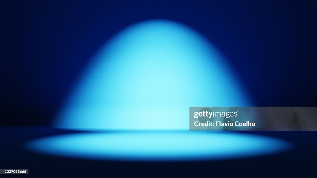Blue spot lit stage background