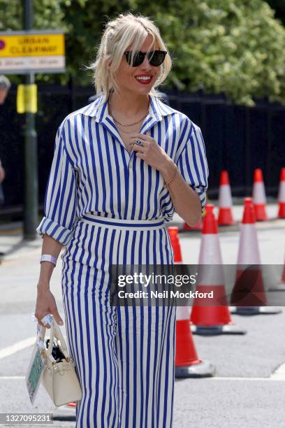 Sienna Miller attends Wimbledon Championships Tennis Tournament Day 7 at All England Lawn Tennis and Croquet Club on July 05, 2021 in London, England.