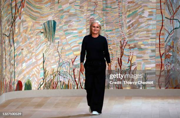 Italian designer Maria Grazia Chiuri walks the runway at the end of the Christian Dior Haute Couture Fall/Winter 2021/2022 show as part of Paris...