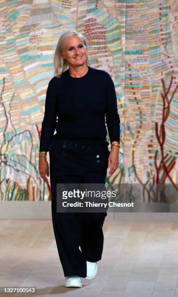 Italian designer Maria Grazia Chiuri walks the runway at the end of the Christian Dior Haute Couture Fall/Winter 2021/2022 show as part of Paris...