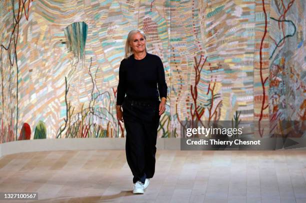 Italian designer Maria Grazia Chiuri walks the runway at the end of the Christian Dior Haute Couture Fall/Winter 2021/2022 show as part of Paris...