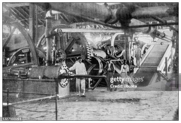 stockillustraties, clipart, cartoons en iconen met antique black and white photograph: cane threshers in sugar mill, puerto rico - factory worker black and white