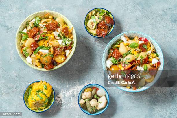 pasta salad  feta in  a bowl - conchiglie photos et images de collection